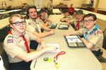 several scouts at a table